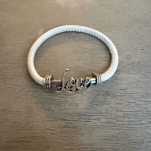 Brighton LOVE bracelet on a white leather band